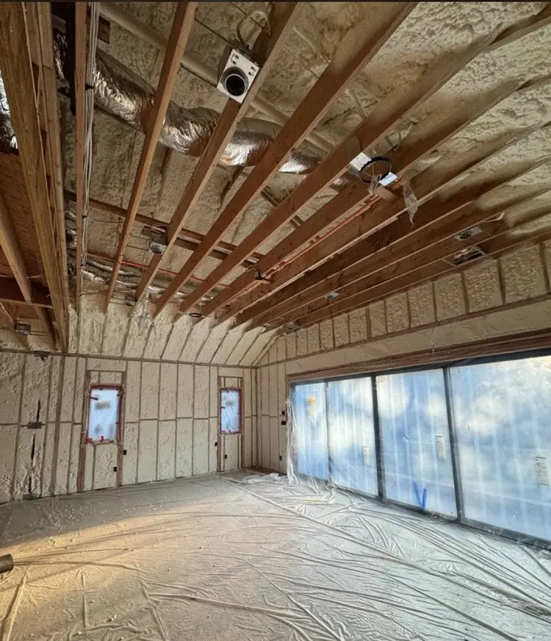 Interior walls and ceiling insulated with spray foam during new construction in State College